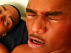 Naked black gay men having kinky fun in the bedroom