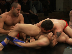 Muscular lovers strip naked to fuck during their wrestling fetish