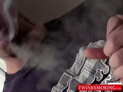 Tattooed skinny dude smoking and shooting cum on the floor