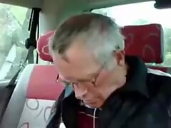 Older man cruise in car