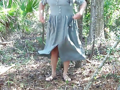 Pee on Green dress in maritime forest 1 - Video 161.mp4