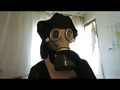 Dolled nun in gasmask