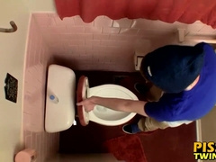 Devin Reynolds grabs his prick & unloads in the toilet