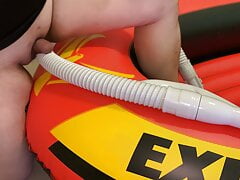 Fat Helmet Guy On Inflatable Boat Rubbing and Humping Vacuum Hose On Small Penis