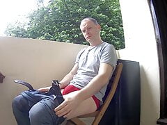 Kudoslong sat on the balcony strips naked and wanks