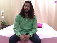 Long-haired dude collects his semen on a plate after masturbation