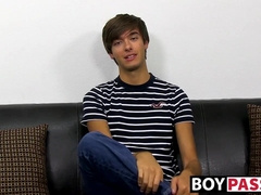 Young dude with bangs pleases himself after the interview