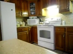 Step daddy makes a snack in the kitchen