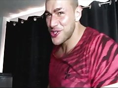 Handsome bodybuilder teasing with his big cock muscle