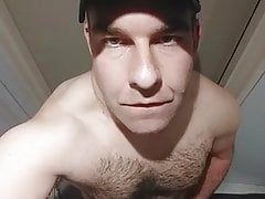 Hairy daddy strokes his cock with eye contact