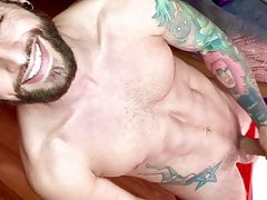 Eddie Danger jacks off his hard cock and lifts weights