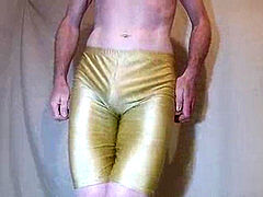 12 cumloads pumped into glossy gold lycra cut-offs - devotee request