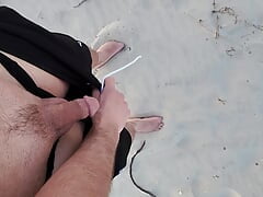 Cumming on the beach