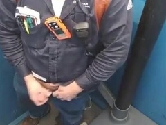 Bearded Bear Wanks Lollipop Outdoors in a Porty Potty