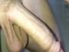 Stroking big cock and balls