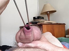 Foreskin with barbecue tongs