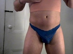 Crossdresser tries on g-string panties in different languages