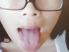 asian cutie with a tongue full of cum