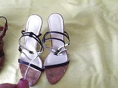 Cumming on strappy cork wedges