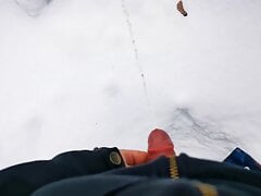 Boy pee in the snow