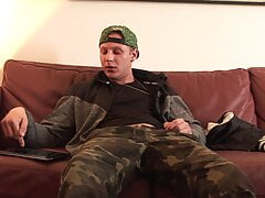 Inhibited   teen strips off his clothes at casting and starts jerking his cock until he squirts