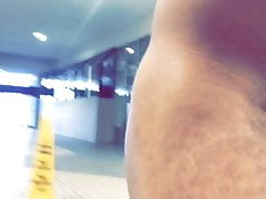 Walking naked in a mall.