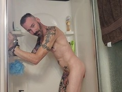 Mikel Donovon plows and gags on his hard dick in the shower!