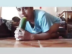 Sucking huge cucumber