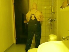 gay man in pvc rainwear