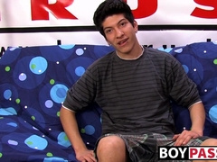 Interviewed young twink jerks off his big cock & cums