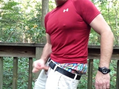 Stroking off in the forest at the public park