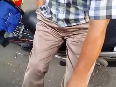 Shiny satin khaki pants trousers caught in public