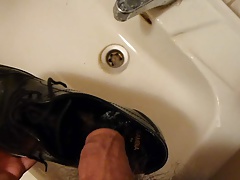 Piss in men's dress shoe