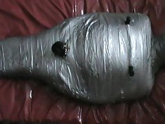 Slave as silver mummy