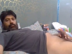 Pakistani daddy Dxxavier enjoys some solo play with his knob