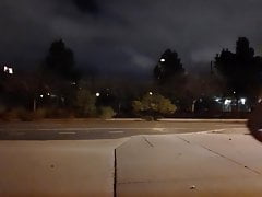 Streaking a street at night under a full moon