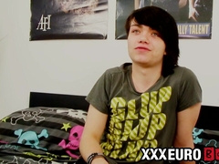 Young gay man with long hair strokes it hard