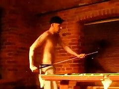 Fart on slave while playing billiard