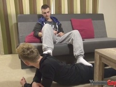 Gay bears stroking their cocks at the gloryhole