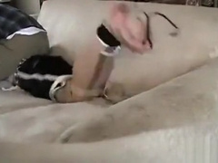 Colin tickled on his bare soles