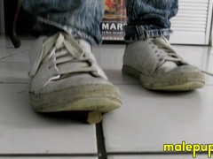 Angry giant Elis Ataxxx crushes tiny people under his dirty sneakers