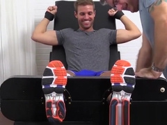 Hunky Dane gets the tickle brush treatment for his sexy feet