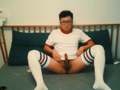 Men in white socks flash themselves to the camera
