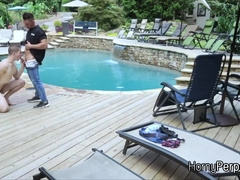 Security guard having fun with trespasser by the pool