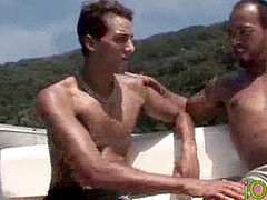 Latino jock moist riding on a boat before facial