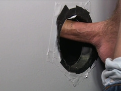 Bearded DILF tries hefty dong through the glory hole