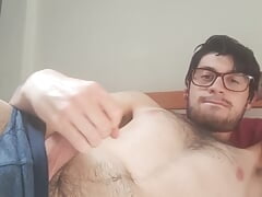 A nice handjob in the bedroom with cumshot on the chest