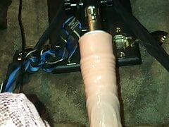 Crossdresser uses a fuck machine