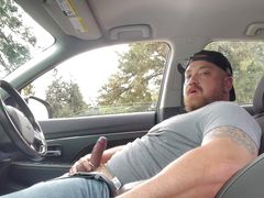 Handsome stocky beefy jock masturbating in car