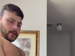 Beefcake disrobes, salivates, and faps large sausage before bellowing popshot